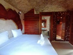 Postel nebo postele na pokoji v ubytování Cabañas la finca 2