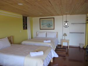 Postel nebo postele na pokoji v ubytování Ecohotel, Finca Colinas y Senderos