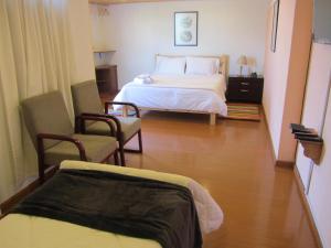 Postel nebo postele na pokoji v ubytování Ecohotel, Finca Colinas y Senderos