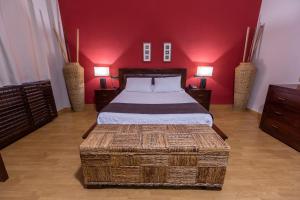 A bed or beds in a room at Hotel de Montaña Rubielos