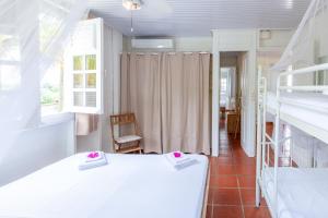 Una cama o camas en una habitación de Villa Vue Sauvage