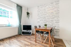 Телевизор и/или развлекательный центр в Fewo-Colonia Köln-Innenstadt