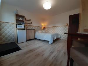 Pokoje gościnne "Lenka"客房内的一张或多张床位