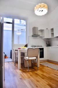 Kuchyň nebo kuchyňský kout v ubytování Les 3 Chambres + 37 fotografií