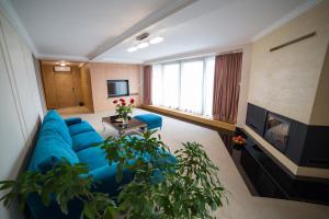 Telewizja i/lub zestaw kina domowego w obiekcie Hotel Avangarda