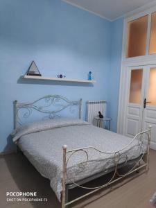 Cama o camas de una habitación en Napulè 10