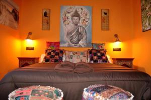 A bed or beds in a room at Casa Rural Mansion Adela con Piscina y Jacuzzi