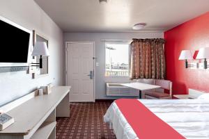 Postel nebo postele na pokoji v ubytování OYO Hotel Houston Southwest I-69