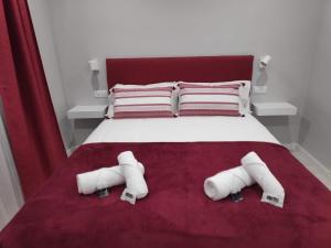 Een bed of bedden in een kamer bij SUITEDREAMS - Boigues 3