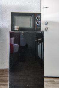 Kuchyň nebo kuchyňský kout v ubytování Hotel Elev8