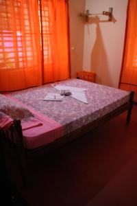 Postel nebo postele na pokoji v ubytování Sukriti beach Resort