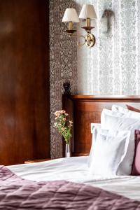 Postel nebo postele na pokoji v ubytování Hotel Atlas Deluxe