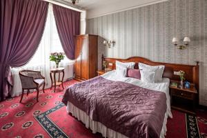 Postel nebo postele na pokoji v ubytování Hotel Atlas Deluxe