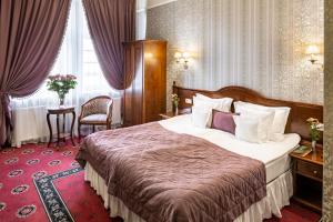 Postel nebo postele na pokoji v ubytování Hotel Atlas Deluxe