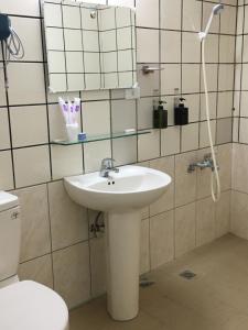 Koupelna v ubytování 瑞恒行館Reui Heng Guesthouse + 37 fotografií