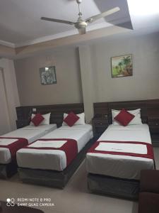 Ένα ή περισσότερα κρεβάτια σε δωμάτιο στο Hotel I-Way Residency Perungudi