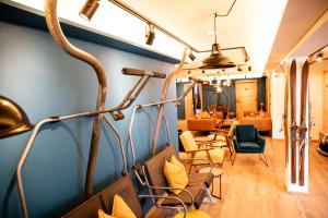 Zona d'estar a Roomie Alps Design Hostel