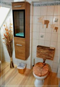Ένα μπάνιο στο Ferienwohnung Heideschwedin