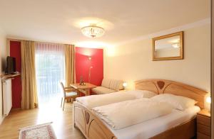 Fotografie z fotogalerie ubytování Hotel Garni Dorferwirt am Irrsee v destinaci Tiefgraben