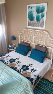 A bed or beds in a room at Kerynia Apartments