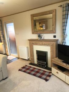 Gallery image of 81 The Heathers, Aviemore Holiday Park , Dalfaber rd Aviemore PH22 1PX in Aviemore