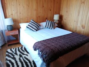 Postel nebo postele na pokoji v ubytování Hotel Green Papudo