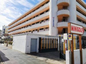 a building with a parking meter in front of it at VV Sweet Home Playa del Inglés "by henrypole home" in San Bartolomé