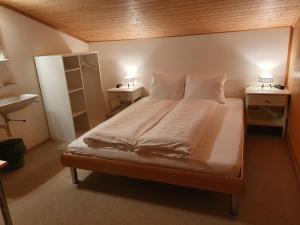 Postel nebo postele na pokoji v ubytování Hotel Restaurant Bergheim