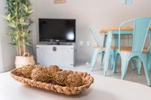 TV a/nebo společenská místnost v ubytování Apartamento Melina Arlu - Barrio La Victoria