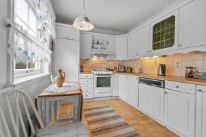 Kuchyň nebo kuchyňský kout v ubytování Villa Reinebringen + 30 fotografií
