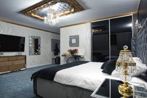 Giường trong phòng chung tại Hotel Campari