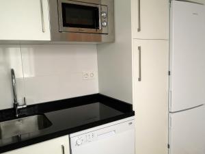 Kuchyňa alebo kuchynka v ubytovaní Apartamento Málaga 2 dormitorios - ARAMAR
