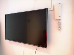 Televízia a/alebo spoločenská miestnosť v ubytovaní Apartamento Málaga 2 dormitorios - ARAMAR