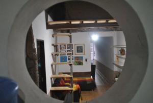 Uma ou mais camas em beliche em um quarto em Hostel Mucugê