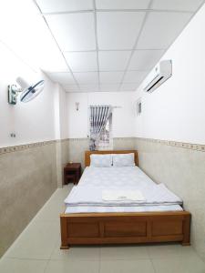 Giường trong phòng chung tại Khách Sạn Thiên Phong