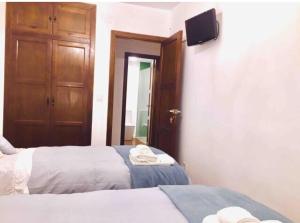 Postel nebo postele na pokoji v ubytování Valencia Beach room with private bathroom coliving