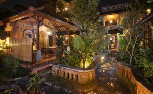 Сад в Ketut's Place Bed & Breakfast Ubud