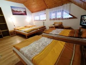 Postel nebo postele na pokoji v ubytování Penzión Poľana + 37 fotografií