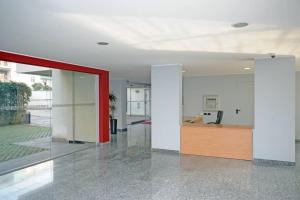 Vestibiulis arba registratūra apgyvendinimo įstaigoje Suite Rent Milan
