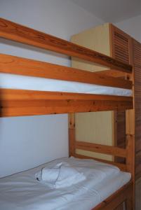 Postel nebo postele na pokoji v ubytování Haus Heidehof Whg. 17