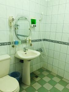 Kylpyhuone majoituspaikassa Huayi Homestay