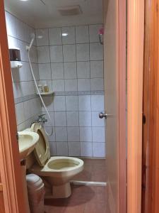 Baðherbergi á Huayi Homestay