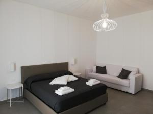 A bed or beds in a room at Chiaralice Még 37 kép