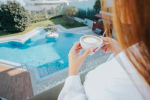 Bazén v ubytování Badam d'Art Boutique Hotel nebo v jeho okolí