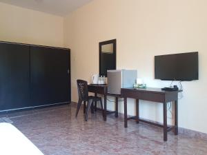 TV a/nebo společenská místnost v ubytování DVilla Guesthouse Langkawi
