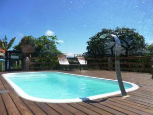 Bazén v ubytování Hospedagem Engenho Fortaleza nebo v jeho okolí