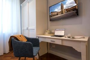 TV a/nebo společenská místnost v ubytování B&B PISTOIA INN