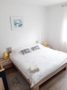 Postel nebo postele na pokoji v ubytování Apartments Monte Grande