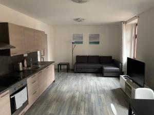 Una cocina o kitchenette en Penzion Fortuna Žatec