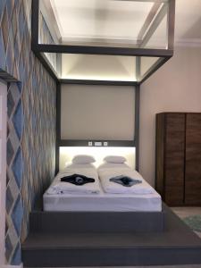 Posteľ alebo postele v izbe v ubytovaní All In Apartman IV.